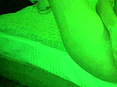 A young amateur girl explores her shaved wet pussy in a homemade solo session, reaching orgasm.