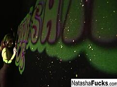 Busty Natasha Nice fingers her wet pussy in sexy black light solo
