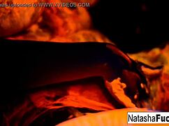 Busty Natasha Nice fingers her wet pussy in sexy black light solo