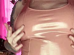 Latex Dress Teasing with Boobs and Tits in Intriguing Style