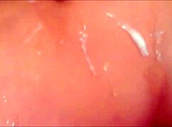 brunette trans woman climaxes, covering her belly in cum