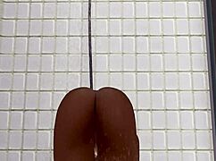 bold teen bathes intensely in wet shower scene