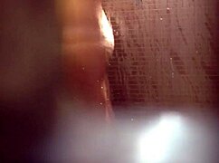 Teen girl caught masturbating her wet pussy in the shower