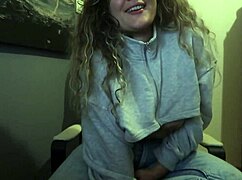 Curvy girl with tight jeans and natural boobs offers a cigarette for you