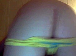 stupid cam girl shows off her big tits solo