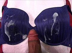 Feeling wild while stroking and spilling on blue 38D bra.