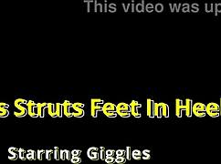 Giggles struts feet in high heels at park!