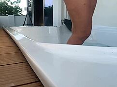 my hot neighbor strips bikini in jacuzzi, huge tits!