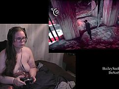 Naked brunette with tattoos and piercings exposes her monster ass in Evil Within playthrough.