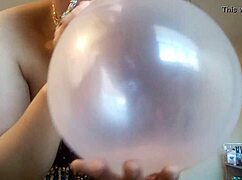 Ginger Paris is messing around with confetti balloons for some kinky fun