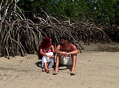 Sexy Redhead Girl Enjoys Wild Action at the Beach by the Sea