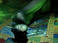 Perfect toes peeking through sexy fishnets on a milf housewife. She teases with nylon stockings and amateur fetish play.