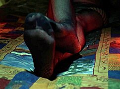 Perfect toes peeking through sexy fishnets on a milf housewife. She teases with nylon stockings and amateur fetish play.