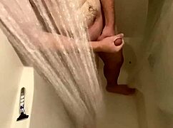 hidden shower cam reveals shaved guy jerking off to cumshot