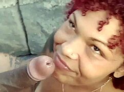 Showing off at the beach, then sucking the big black cock on the rocks.