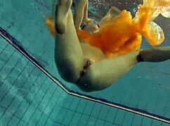 Nastya strips her clothes and shows naked hot body in the pool