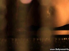 brunette belly dancer undresses teasingly