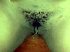 Cyndy blackslave squirts with anal plug spanking