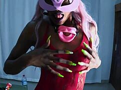 Tropicalpussy teases in red high heels looking so alluring.