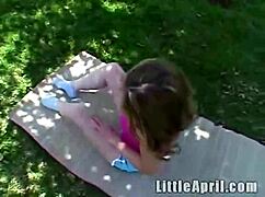 Little april intensely fingers her pussy at the park, reaching orgasm