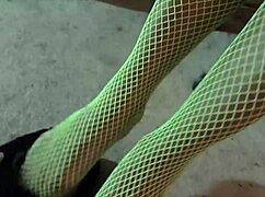 Worship my ebony feet in green fishnets for domination.
