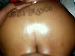ebony woman with big oiled ass in scene