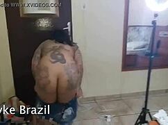 Tattooed mommy takes two big cocks anally and sucks deeply