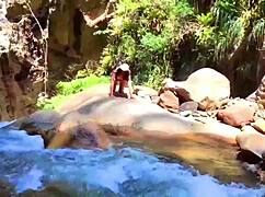 lilyan is masturbating with toys on the river banks.