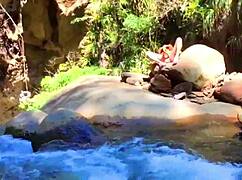 lilyan is masturbating with toys on the river banks.