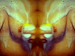 milf bathes sensually in shower, massaging ass in slow motion mirror view.