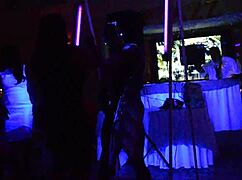 male stripper entertains milfs with glowing show