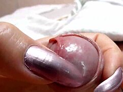 Amateur Girl Gives Intense Handjob With Clear Purple Nails.