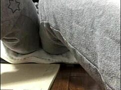 Japanese girl masturbates alone in front of the camera, getting excited watching herself.