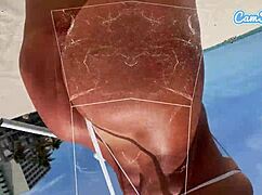 big ass latina rides trike on public beach