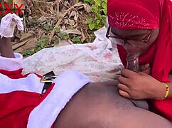 Santa Gifts Babe in Hijab in Bush