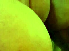 Busty ginger milf shows off massive muscles flexing in the mirror. Her big tits steal the spotlight.