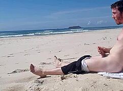 Hey, check out this beach jerk-off session! 😎