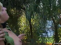 in the public park, a busty blonde gets bound and dominated in a kinky outdoor fuck
