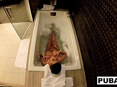 Sexy milf jezebelle bond casually films herself masturbating in the bath, showing big tits and ass.