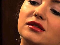 A slave with big natural tits seduces her mistress in a sensual lesbian scene