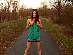 Angel Undresses On Sidewalk