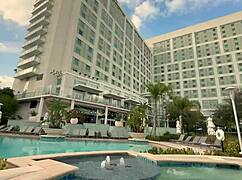 Hot blonde milf shows off in public hot tub