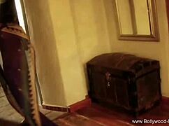 brunette asian seduces with striptease and nude dancing techniques.