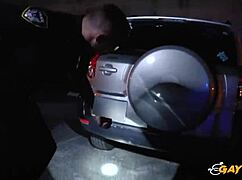 Two gay cops suck and ride big black cock outdoors in hardcore action.