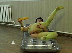 Brunette in pantyhose stretches her anal with a toy, fucking her juicy ass to a gaping orgasm