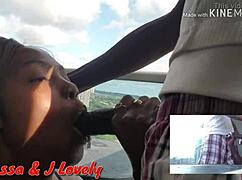 Hot black chick with big tits gives blowjob to monster cock