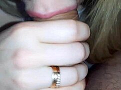 Wife greets husband in sexy outfit, gives blowjob after work.