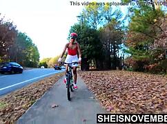 just a tiny ebony babe riding a bike with her booty out in public!