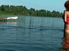 Pamela strips naked in a lake for ginger juice outdoors