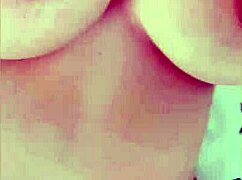 Busty babe teases big nipples while parents sleep nearby! 📸